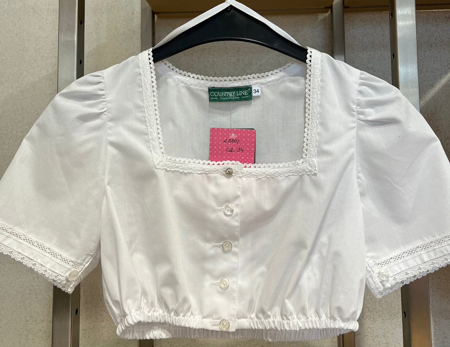 Dirndlbluse mit Spitzenborte